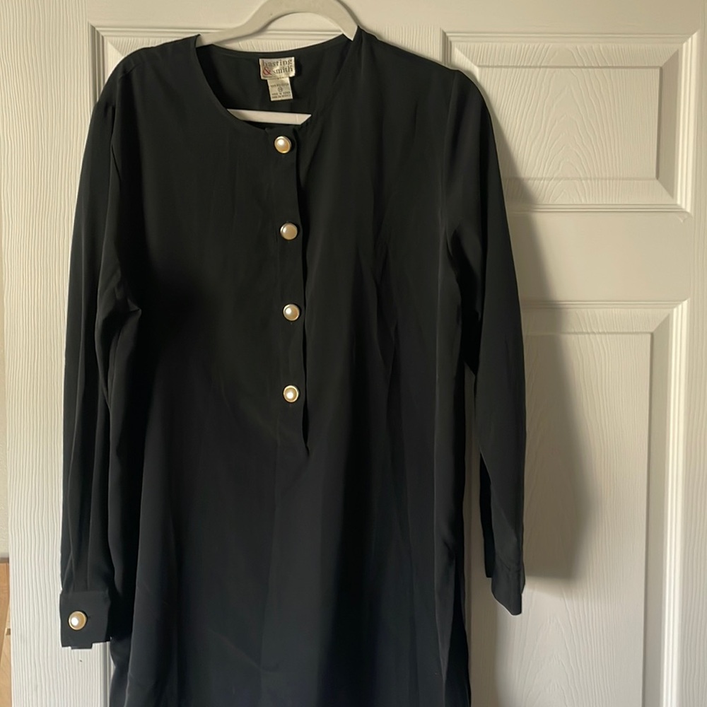 Black long sleeve women’s blouse with pearl and gold colored buttons